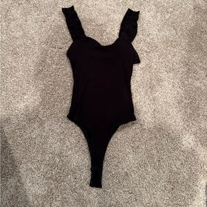 Alya Black Ribbed Bodysuit with Ruffle Detail